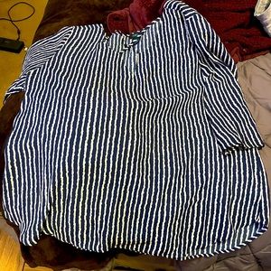 Stripped dark blue and white lang sleeve very lightweight shirt. It’s a size 2x